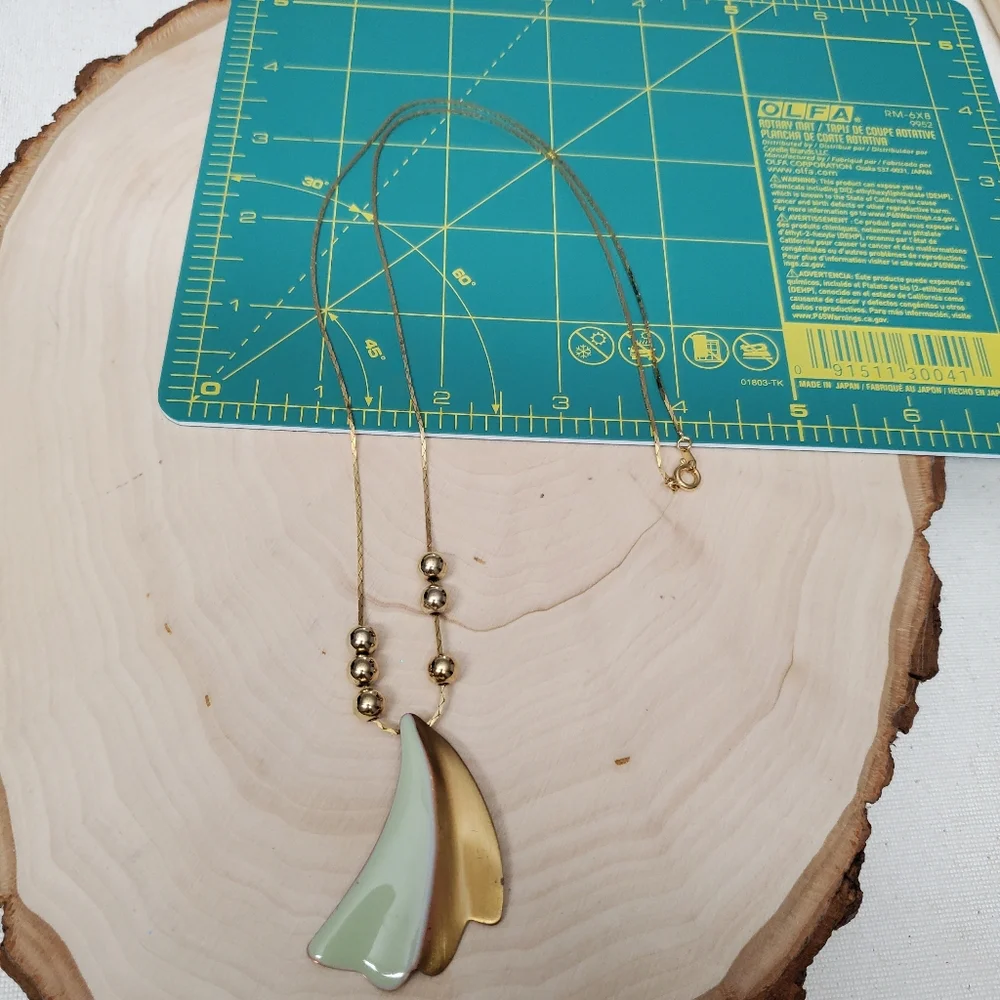 Gold Bead Illusion Horn Necklace